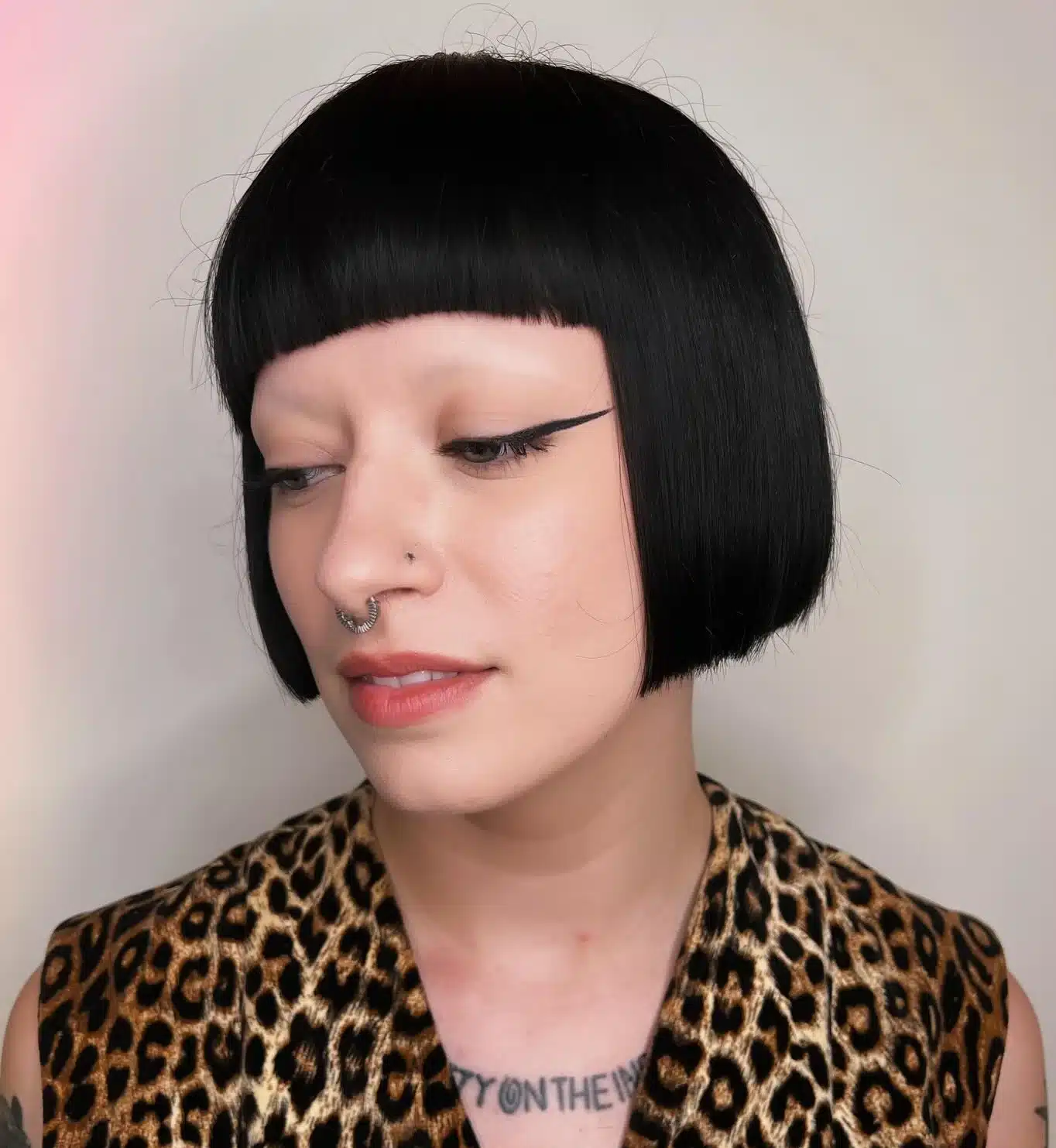24 Short Hairstyles to Keep Your Look on Trend in 2026 9 Structured short box bob with geometric lines