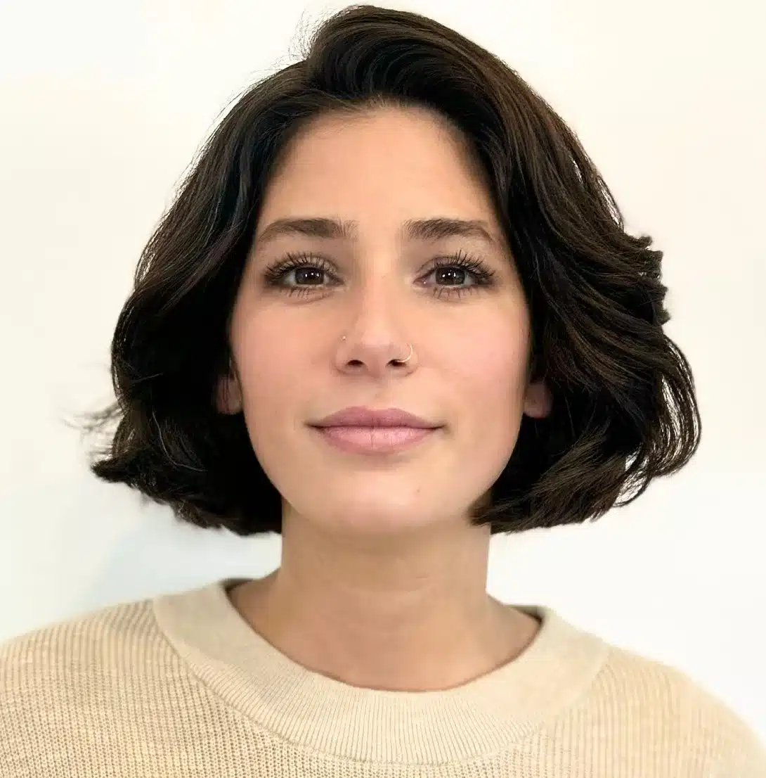 24 Short Hairstyles to Keep Your Look on Trend in 2026 11 Polished jaw-length Italian bob with a smooth finish