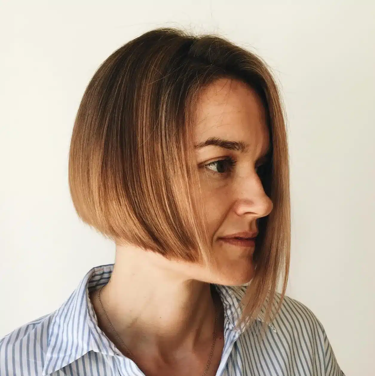 24 Short Hairstyles to Keep Your Look on Trend in 2026 12 Asymmetrical bob with one side longer than the other