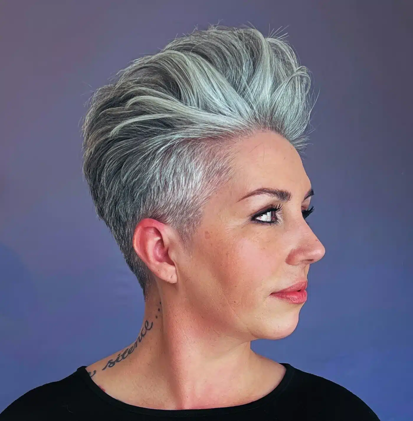 24 Short Hairstyles to Keep Your Look on Trend in 2026 15 Dramatic pixie with voluminous pompadour bangs