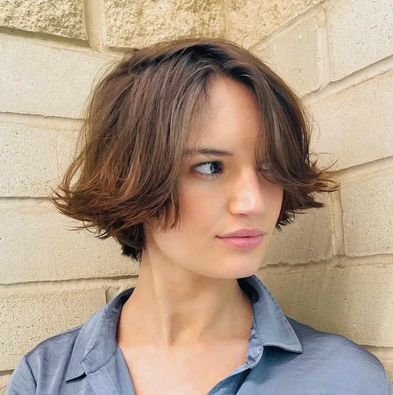 24 Short Hairstyles to Keep Your Look on Trend in 2026 16 Short textured bob with playful flipped ends