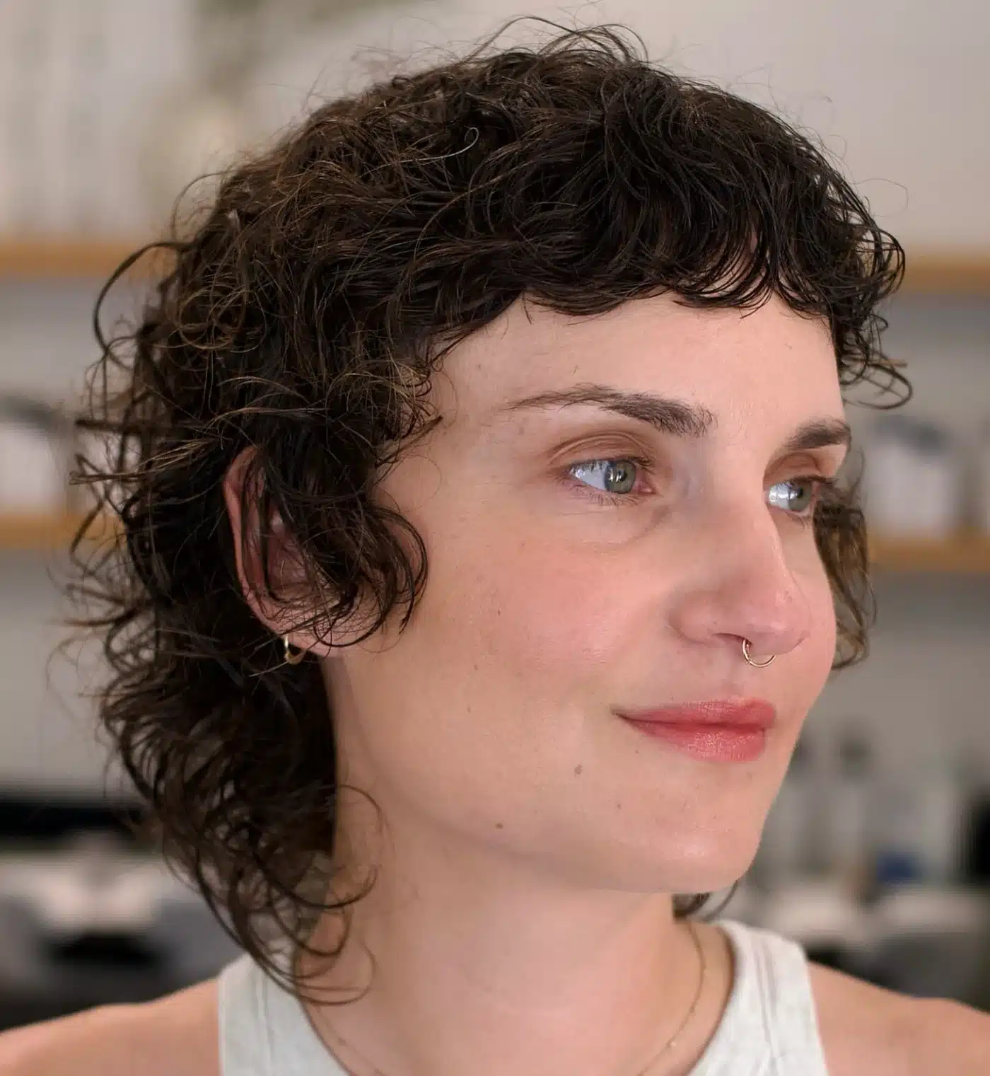 24 Short Hairstyles to Keep Your Look on Trend in 2026 17 Mullet-inspired shag haircut designed for curly hair