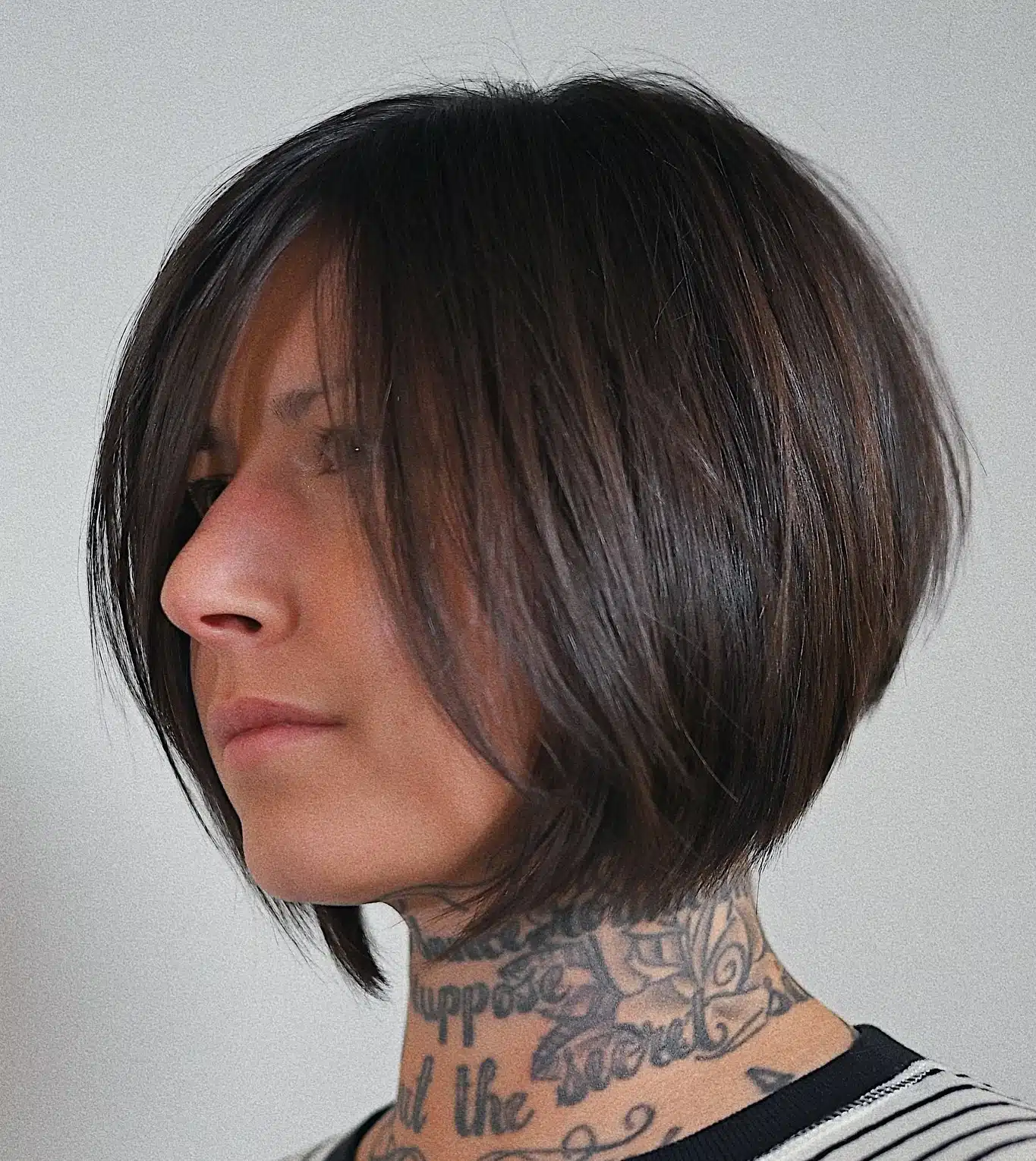 24 Short Hairstyles to Keep Your Look on Trend in 2026 18 Short face-framing bob with angled lines