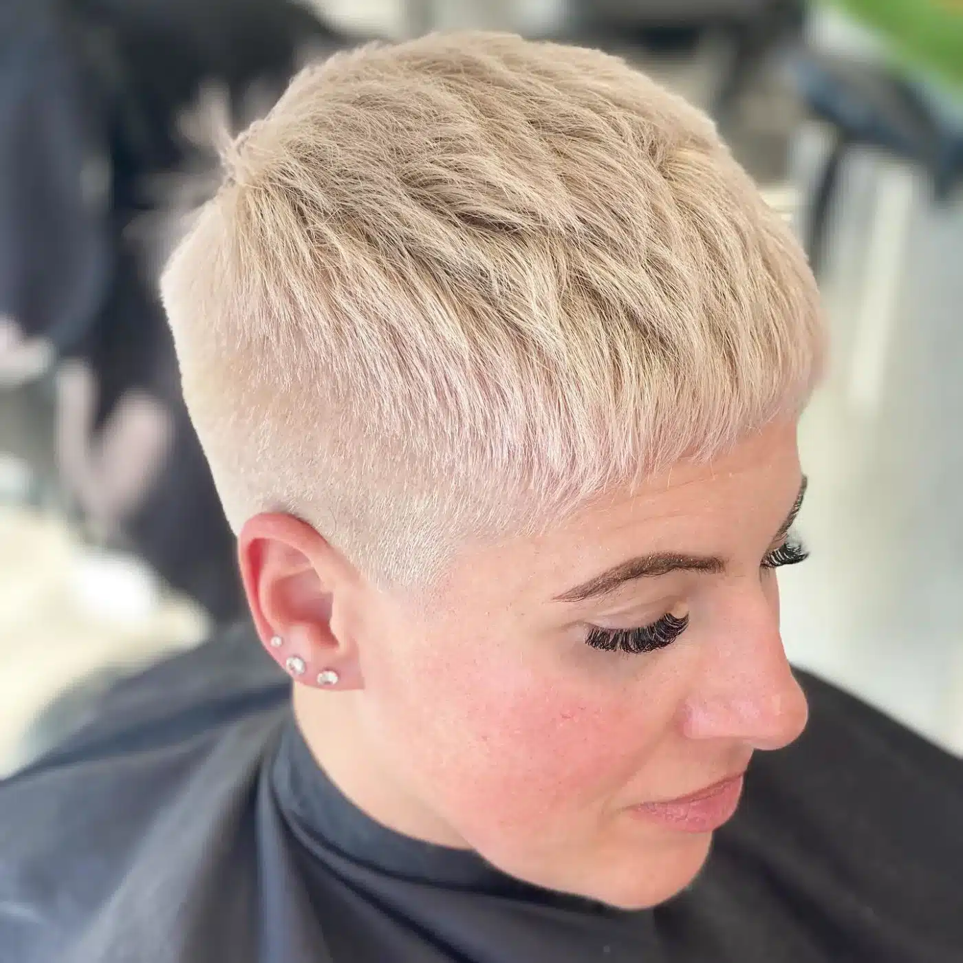 24 Short Hairstyles to Keep Your Look on Trend in 2026 20 Women's short textured crop with closely tapered sides
