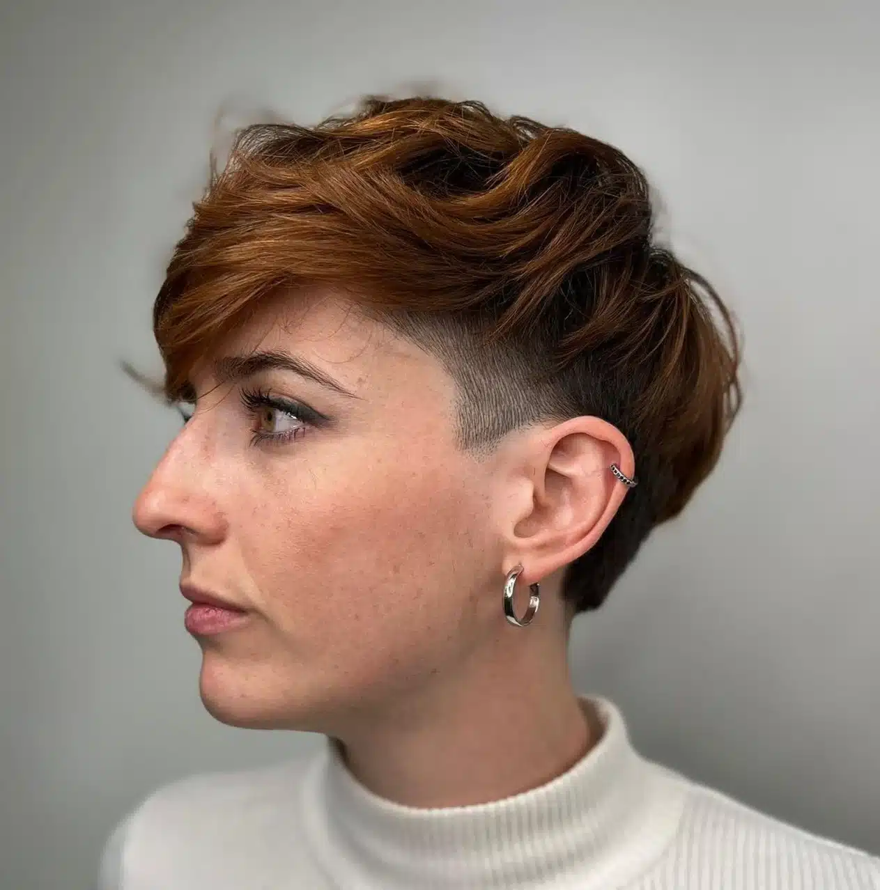 24 Short Hairstyles to Keep Your Look on Trend in 2026 23 Layered pixie with subtle undercut details