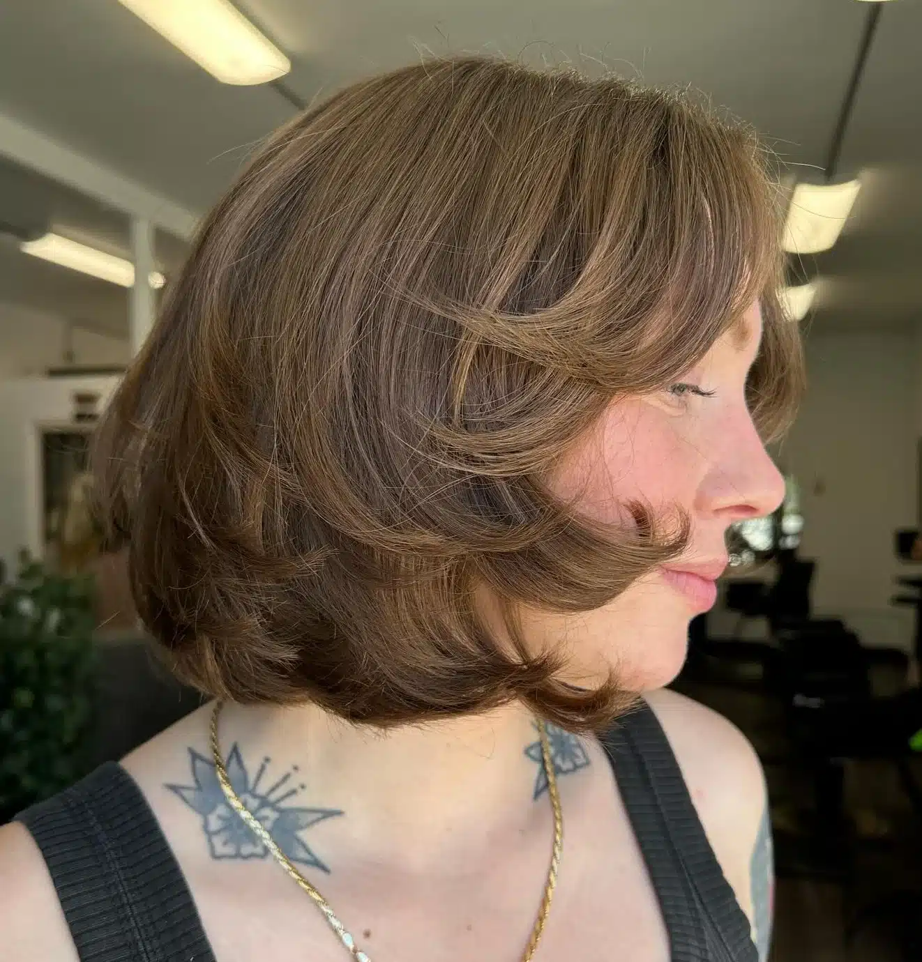 24 Short Hairstyles to Keep Your Look on Trend in 2026 24 Bob with soft flipped layers for added volume