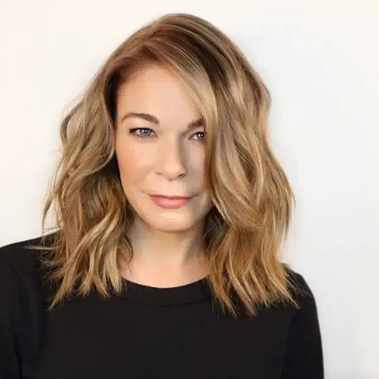 Side-Swept Lob with romantic sweeping fringe