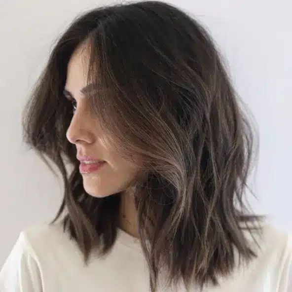 Face-Framing hairstyle with delicate strands around the face