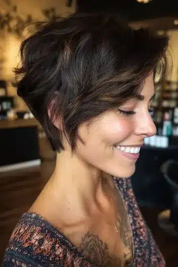 Textured bixie with caramel highlights representing 31 Bixie Haircuts That Perfectly Blend Bob and Pixie Hairstyles