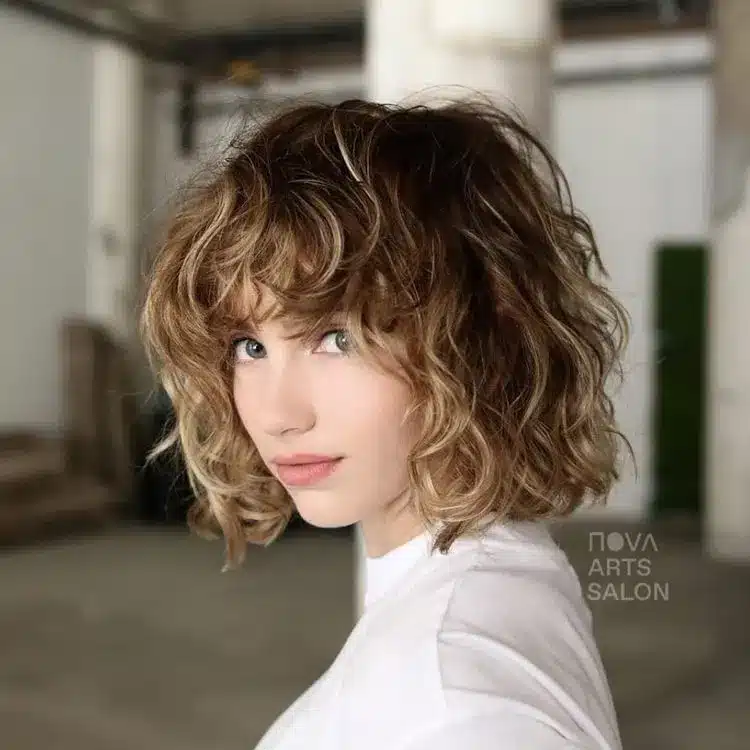 35 Short Brown Hairstyles You'll Be Seeing Everywhere 16 Wavy Baby Bob
