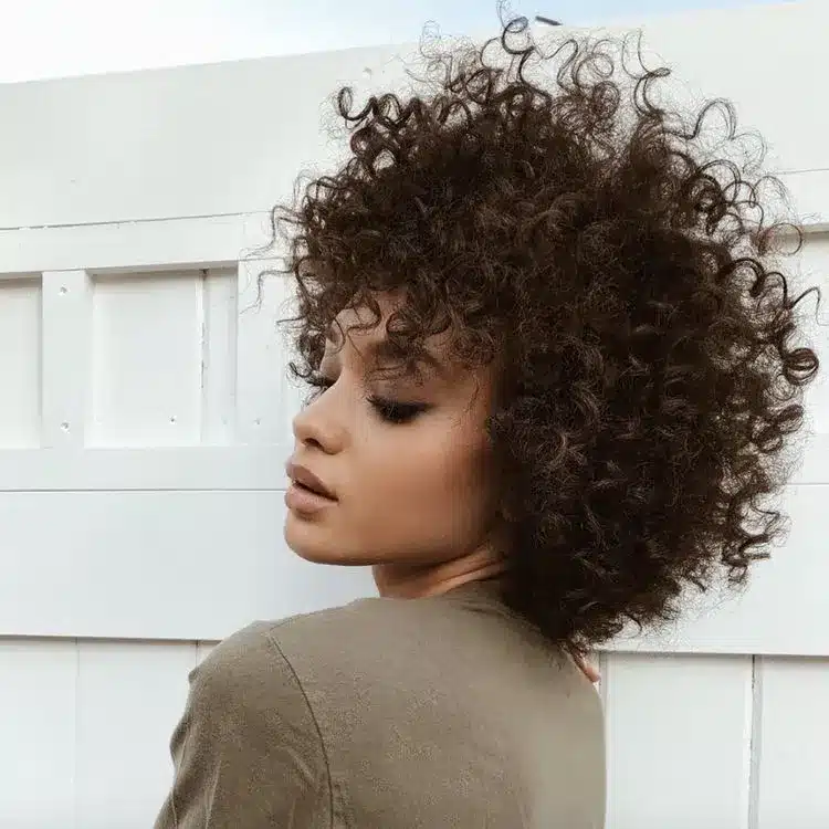 35 Short Brown Hairstyles You'll Be Seeing Everywhere 21 Curly Crop