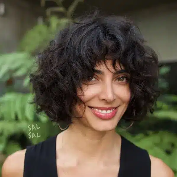 35 Short Brown Hairstyles You'll Be Seeing Everywhere 32 Curly Chin Bob