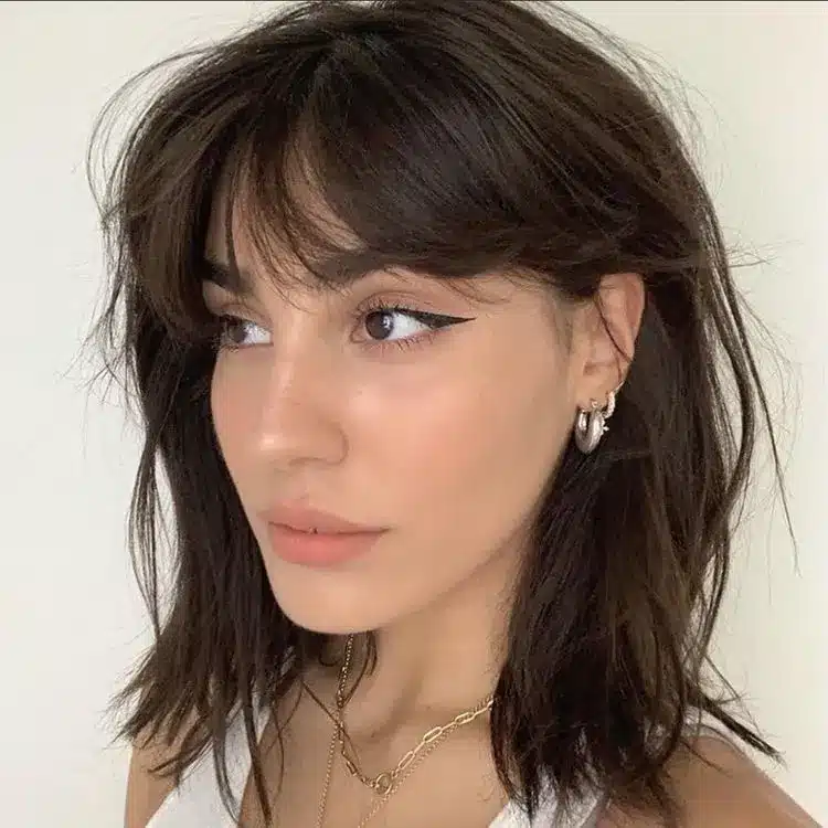 35 Short Brown Hairstyles You'll Be Seeing Everywhere 4 Wispy Curtain Bangs
