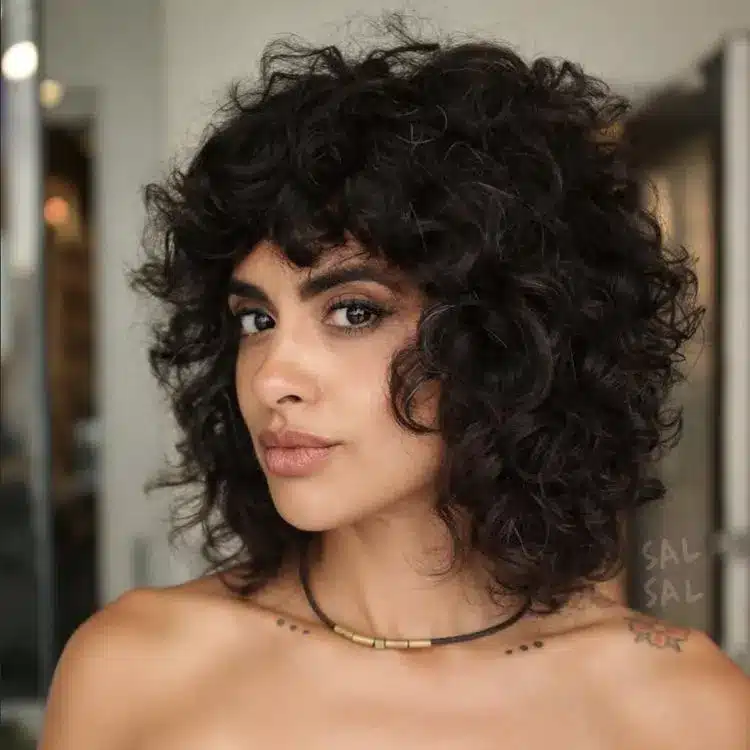 35 Short Brown Hairstyles You'll Be Seeing Everywhere 5 Retro Curly Bangs