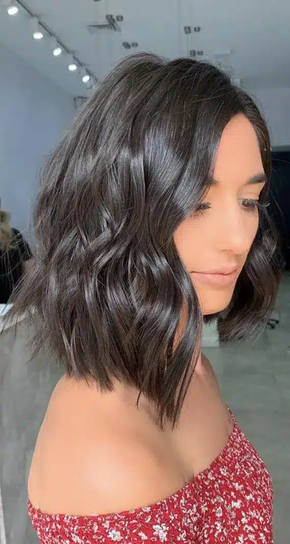 35 Short Brown Hairstyles You'll Be Seeing Everywhere 9 Angled Shoulder Cut
