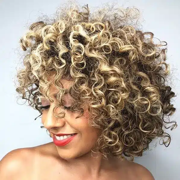 Layered curly lob from 34 Short Bob Hairstyles That Never Go Out Of Style