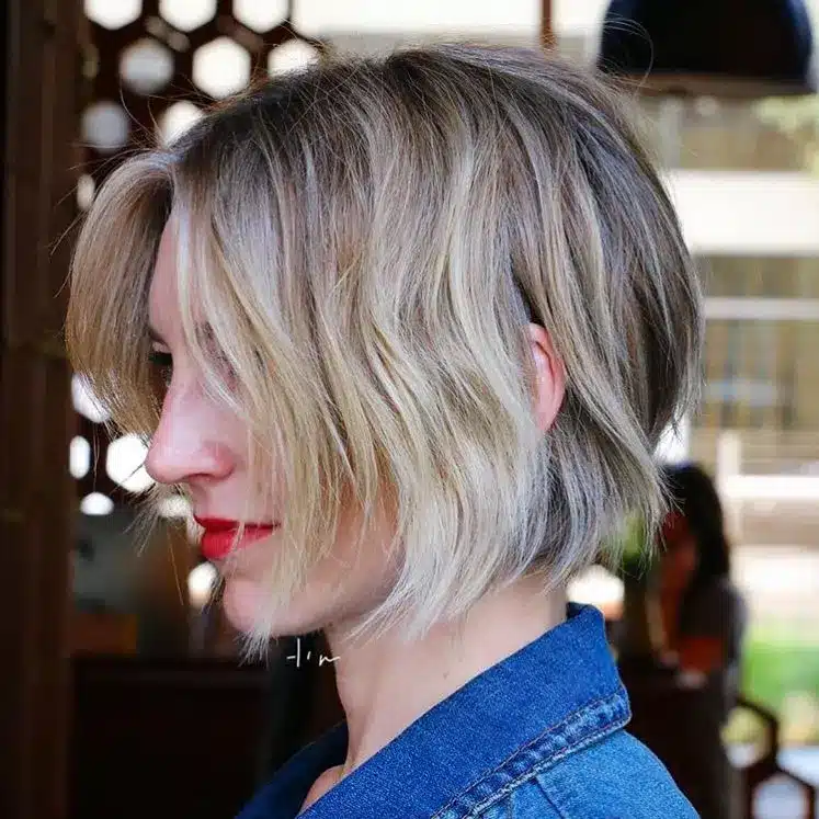 Chin-grazing bob showcased in 34 Short Bob Hairstyles That Never Go Out Of Style