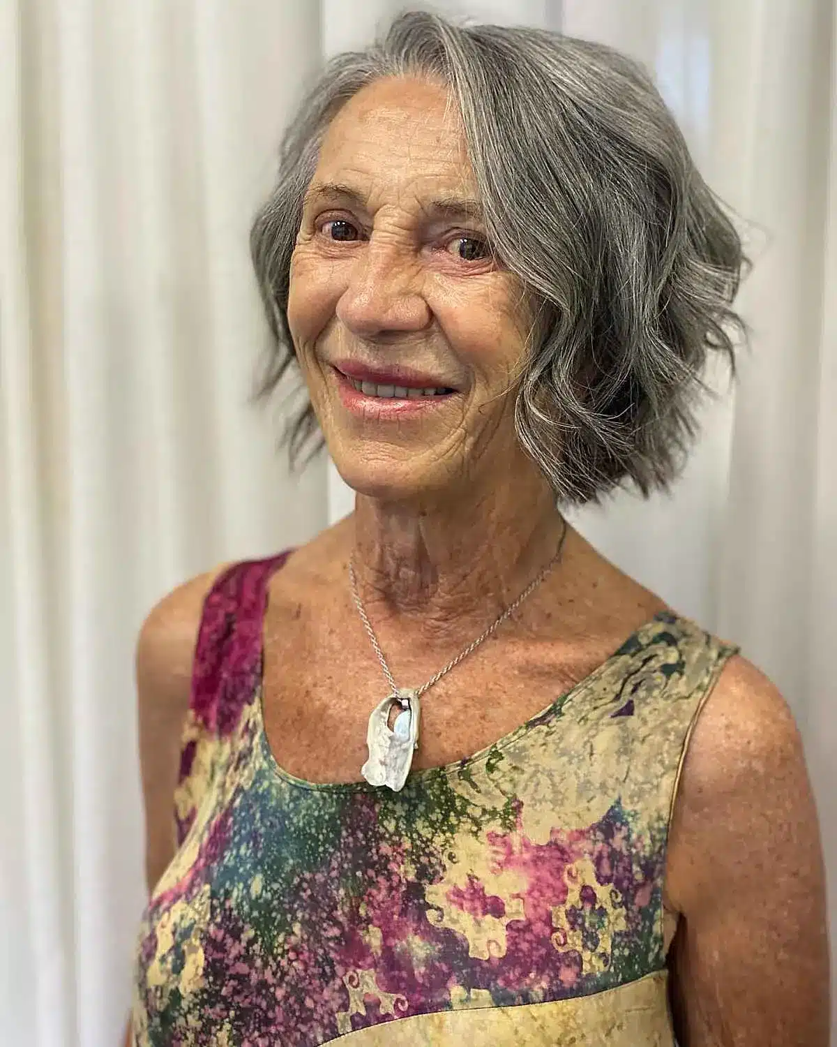 chin-length grey bob cut