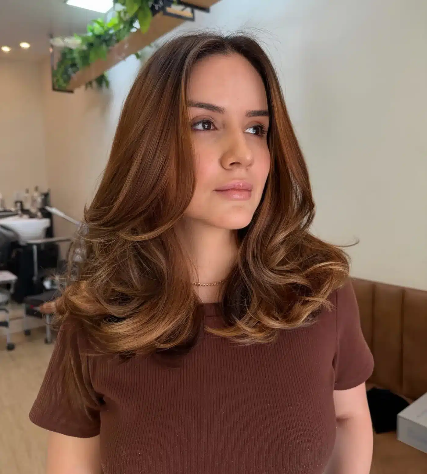 50 Low-Maintenance Medium-Length Haircuts for Busy Women 8 Root-Smudge Chest-Grazing Cut with Long Curtain Layers