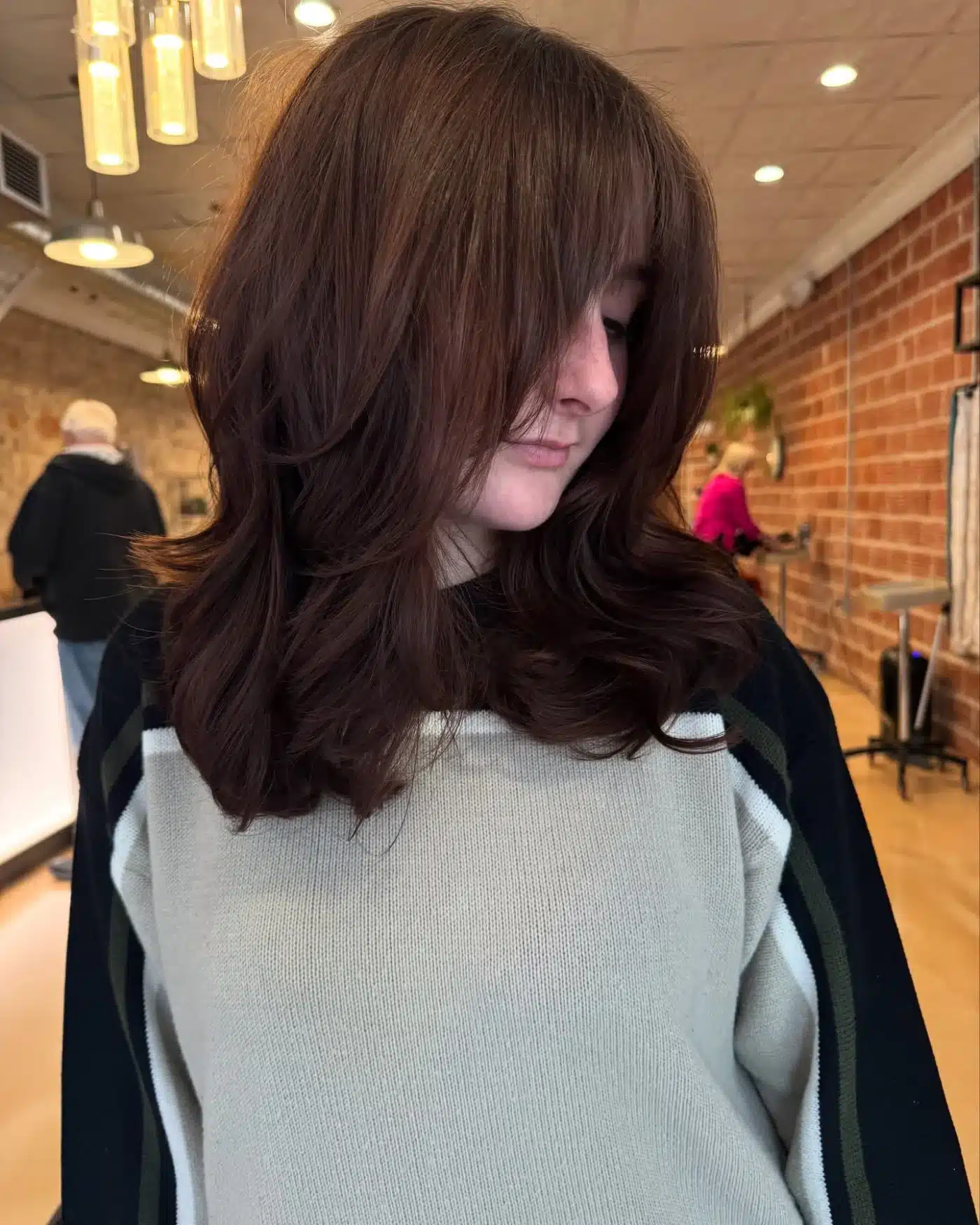 50 Low-Maintenance Medium-Length Haircuts for Busy Women 10 Rounded Face-Framing Layers with Soft Curtain Fringe
