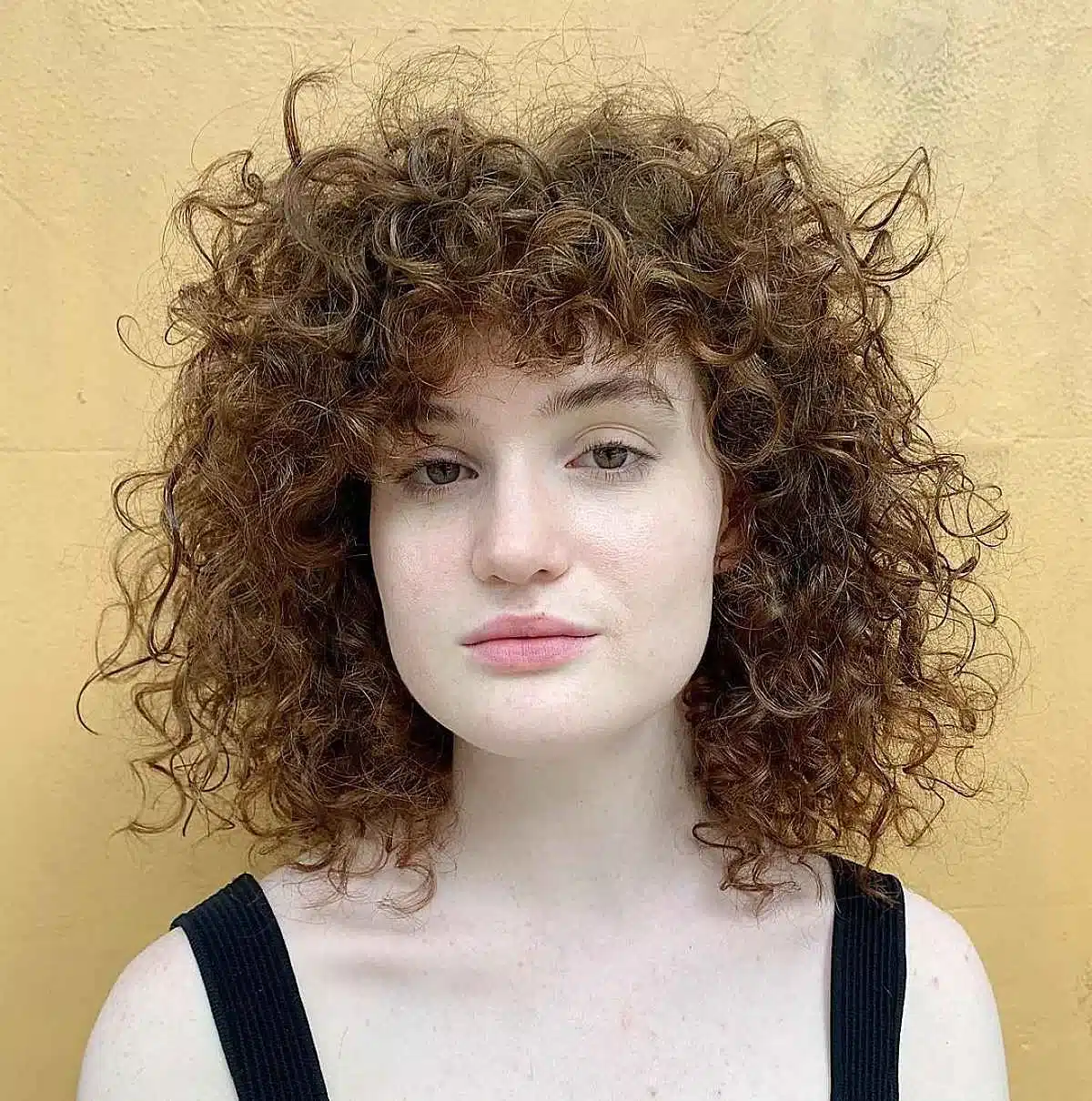 50 Low-Maintenance Medium-Length Haircuts for Busy Women 38 Shoulder-Length Chop for Curly Hair