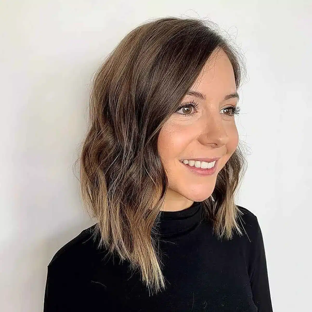50 Low-Maintenance Medium-Length Haircuts for Busy Women 39 Collarbone-Length Tousled Waves