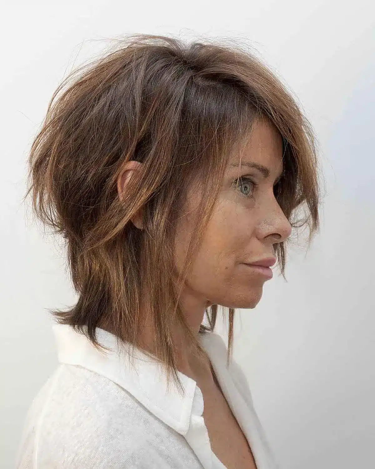50 Low-Maintenance Medium-Length Haircuts for Busy Women 43 Shoulder-Length Shag for Women Over 40