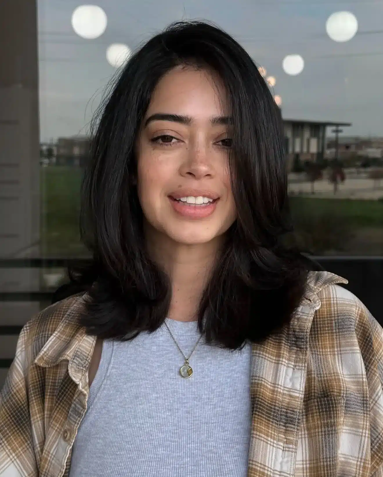 50 Low-Maintenance Medium-Length Haircuts for Busy Women 6 Dark Brunette Face-Framing Medium Layered Cut